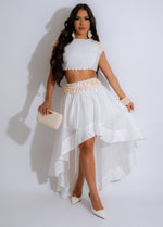 Stylish white skirt set with matching top and flowing skirt