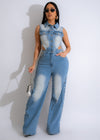 Voyager Jumpsuit Light Denim with adjustable straps and front pockets