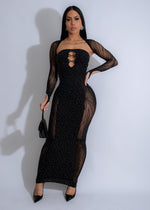 Close-up of the Cosmic Glow Rhinestones Maxi Dress Black with sparkling rhinestones and deep black fabric