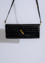 Alt text: The Woven Grace Black, a stylish and versatile handbag perfect for everyday use