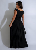 Obsidian Charm Ruched Maxi Dress Black - Side view showcasing the elegant black color and floor-length design