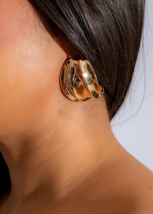 Shiny 24K gold helix earrings with intricate twisted design and elegant appeal