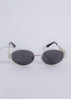 Stylish silver round sunglasses with reflective lenses and black frames for a trendy look