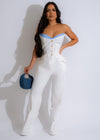 Two-piece white pant set with matching top and bottom for women