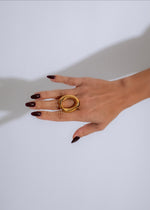 Shiny gold infinity wave ring, a beautiful and elegant jewelry accessory