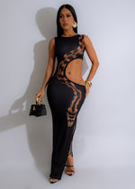 Stunning black maxi dress with a stylish snake print pattern and flattering silhouette