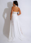 An elegant and stylish white maxi dress, perfect for any summer occasion