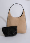 Stylish black tote bag with minimalistic design and spacious interior for everyday use