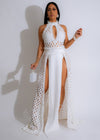 Stunning white maxi dress with flowy skirt and delicate lace detailing