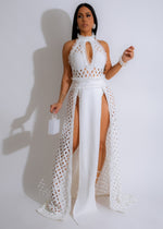 Stunning white maxi dress with flowy skirt and delicate lace detailing