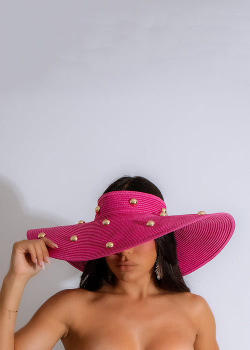 Beautiful pink Days In Malibu hat with wide brim and bow detail, perfect for beach days and summer outings