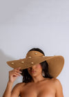 Beautiful woman wearing trendy Days In Malibu Hat Brown at the beach