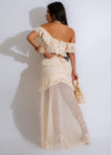 Two-piece knit skirt set in a neutral nude color with fringe detailing