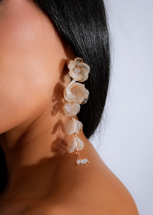 Lunar Bloom Earrings Nude, a stunning pair of delicate, handcrafted floral earrings in a soft nude hue, perfect for adding a touch of elegance to any outfit