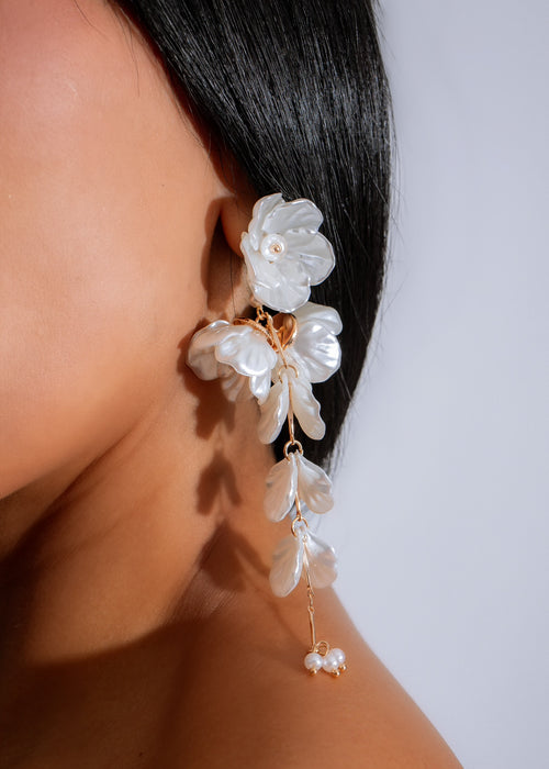 Beautiful pair of Bloomfall Earrings in White, featuring intricate floral design