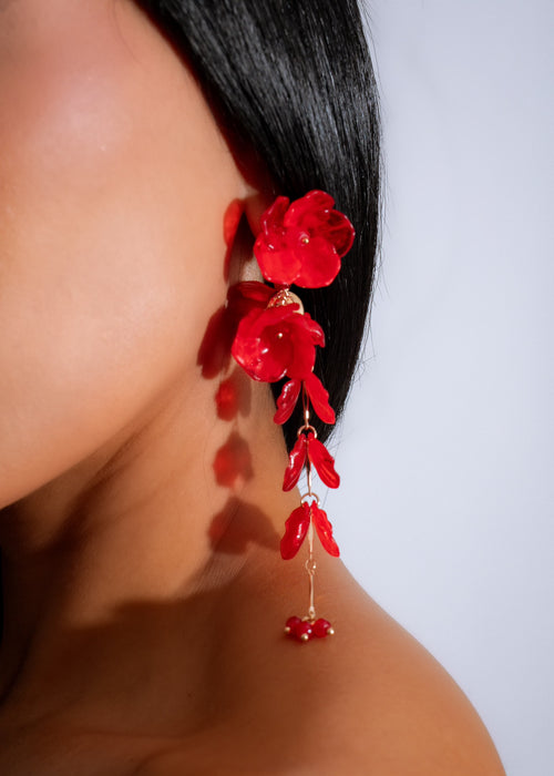 Stunning red Lunar Bloom Earrings featuring intricate floral design and sparkling gems