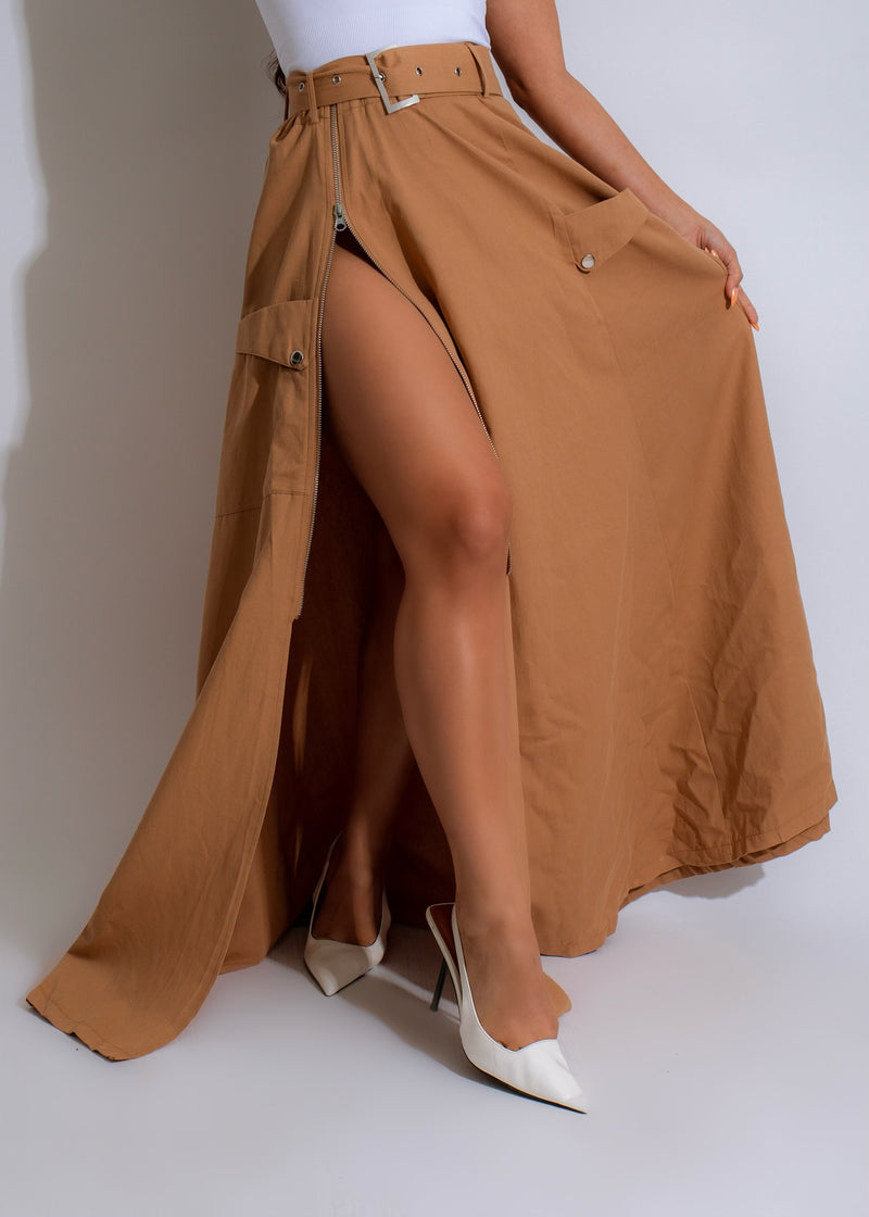 A close-up image of The Utility Skirt Brown, showcasing its textured fabric and flattering fit