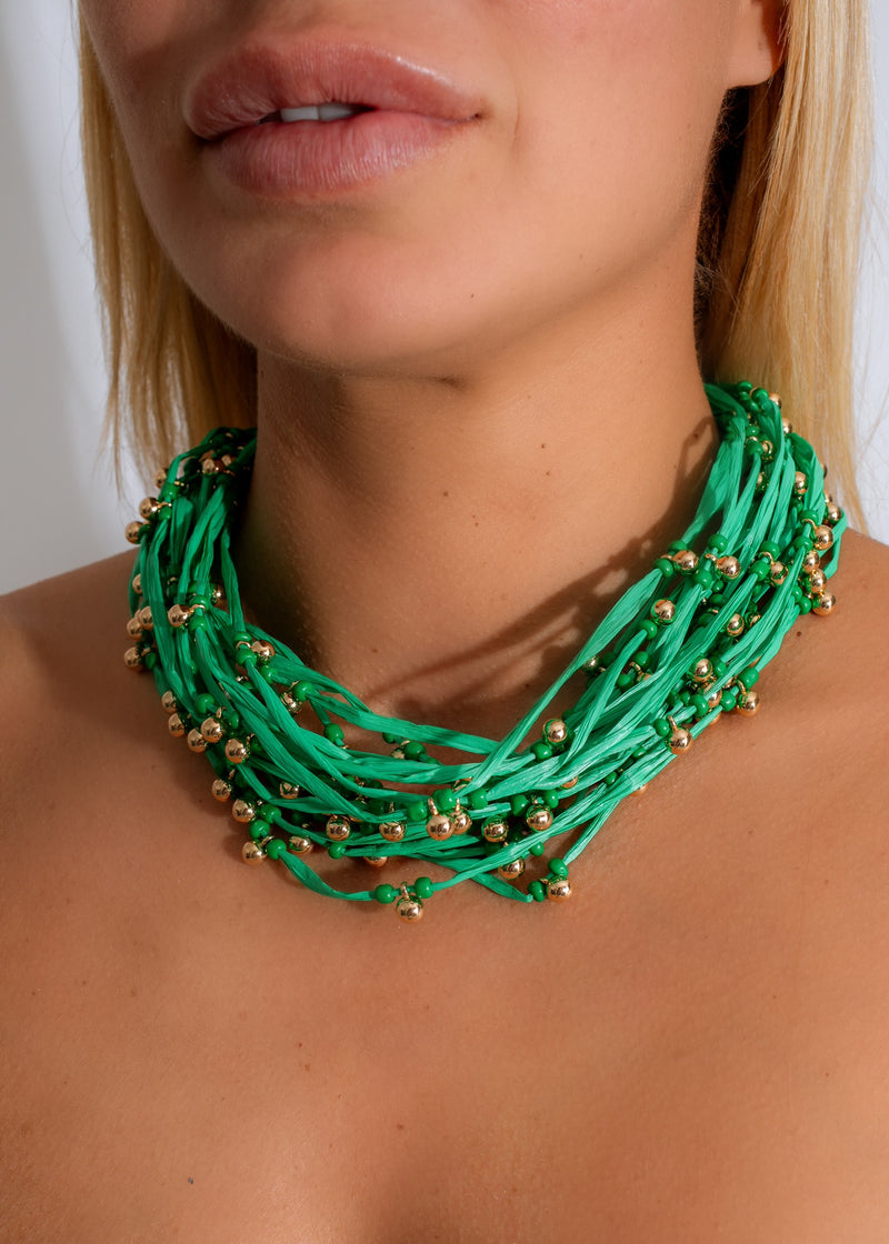 Handmade green beaded necklace perfect for summer outfits and beach days