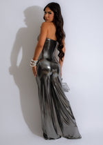 Gorgeous model showcasing the sexy silver metallic jumpsuit with a sleek and eye-catching appearance