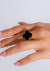 Close-up image of black Made You Look Ring with intricate design and shiny finish