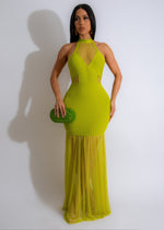 Simple Glow Mesh Bandage Maxi Dress Green in a lush garden setting, featuring elegant, flowing design with a flattering mesh bandage bodice and delicate green hue