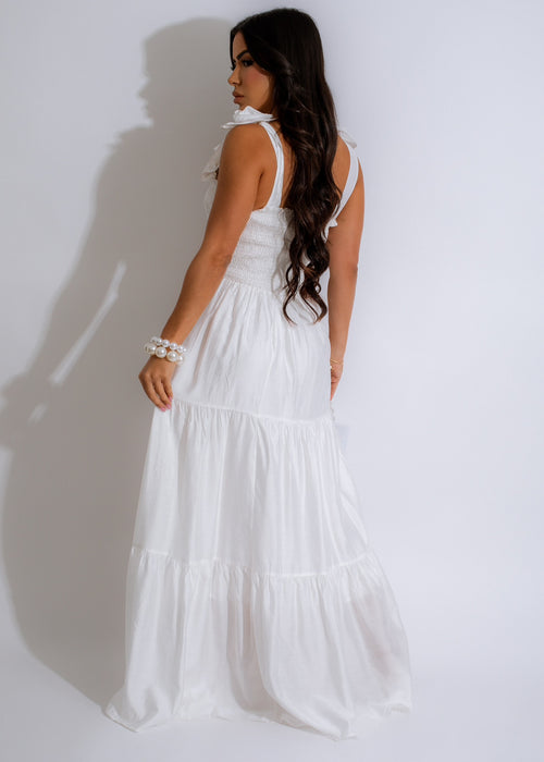 Enchanted Rose Maxi Dress White, a stunning and ethereal gown featuring a flattering silhouette, ethereal tulle overlay, and romantic rose embellishments