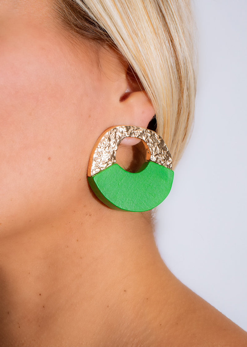 A close-up image of the Get It Earring Green, a stylish and elegant statement earring with a unique green color and intricate design