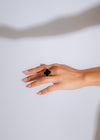 Hand model wearing the stunning black Made You Look Ring with eye-catching details