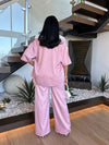 All For You Satin Pant Set Pink - Model wearing, Stylish and elegant pink satin pant set on a model