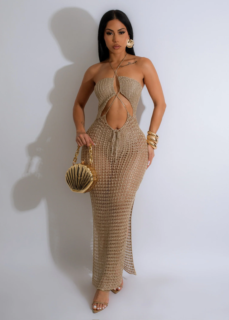 Absolutely Crochet Metallic Maxi Dress Gold shining in the sunlight, perfect for a special occasion 