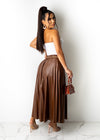  Woman wearing You Need Me Skirt, showcasing its flattering fit and stylish design